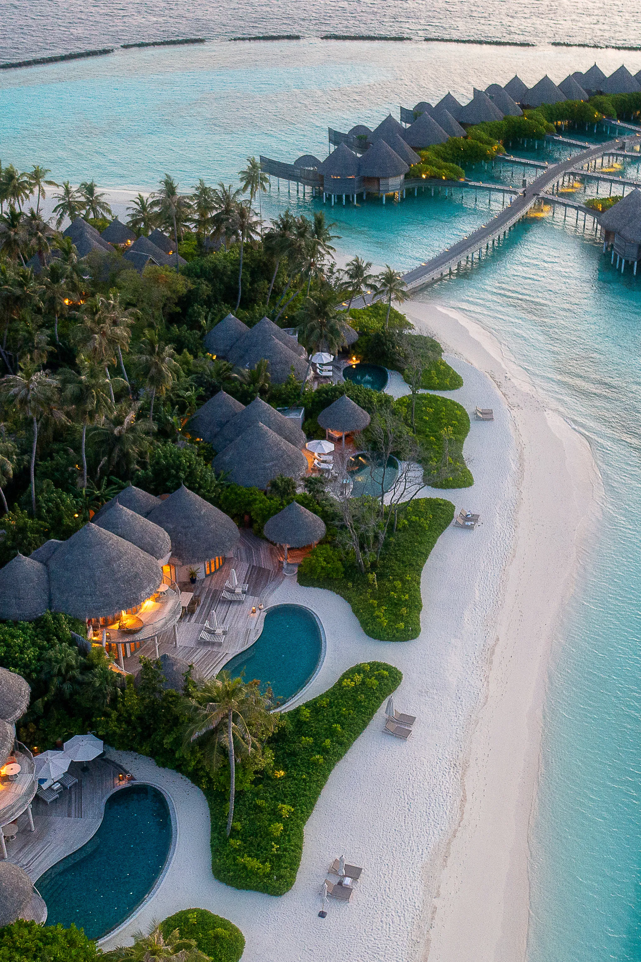 Maldives overwater villa at sunrise